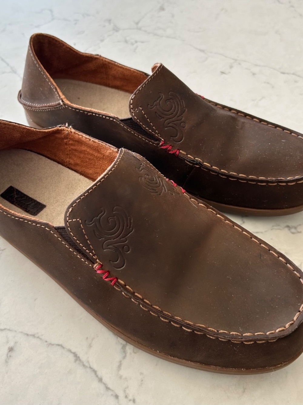 Olukai brown leather slip ons size 9.5